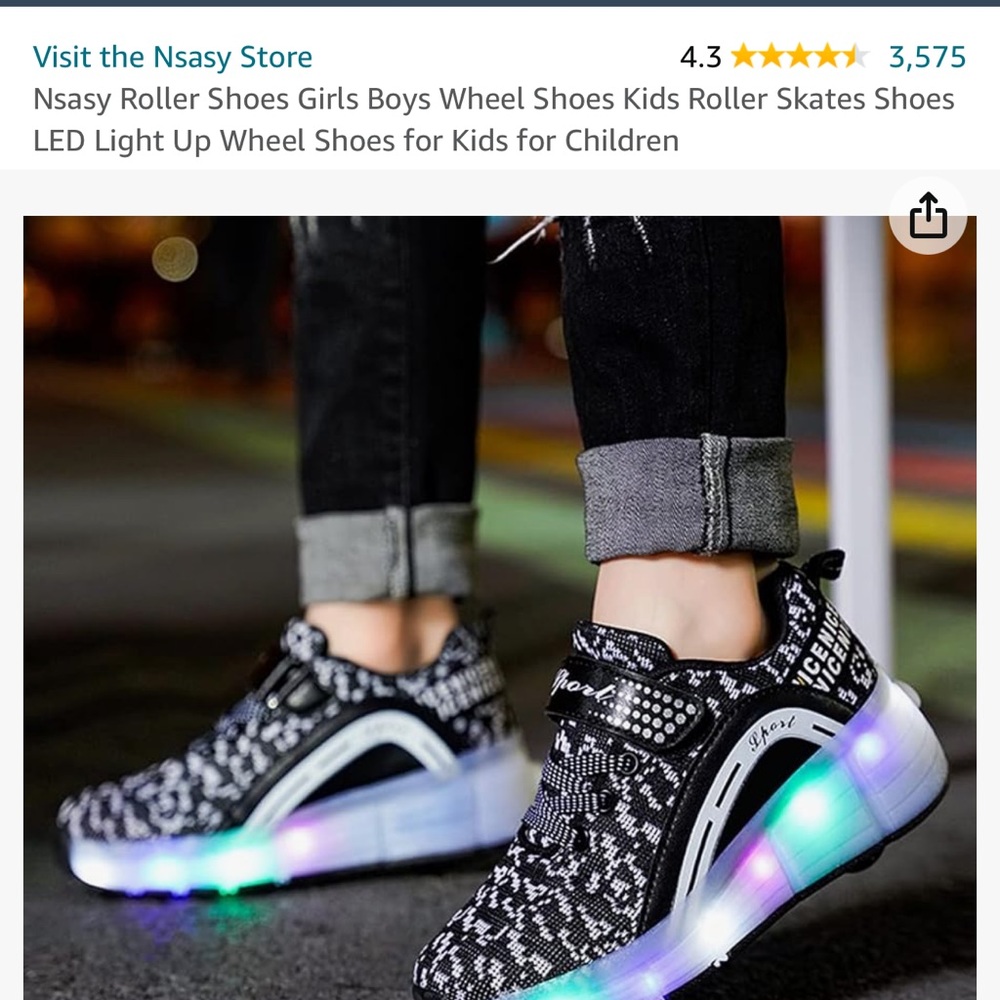 Black and white roller shoes I bought on Amazon. The size is a 3 1/2 or 4.